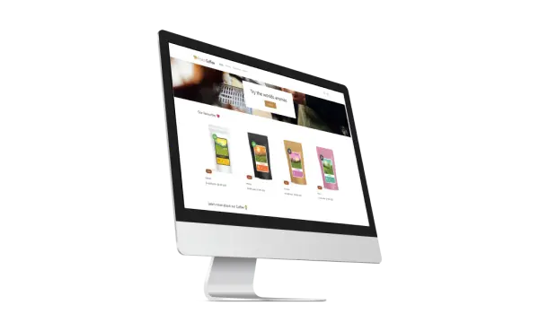 Apple monitor displaying a Shopify Coffeee store 